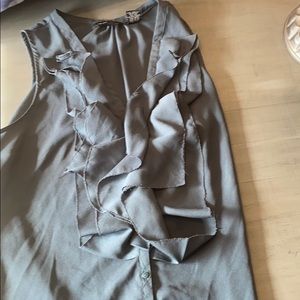 Tunic and sleeveless blouse